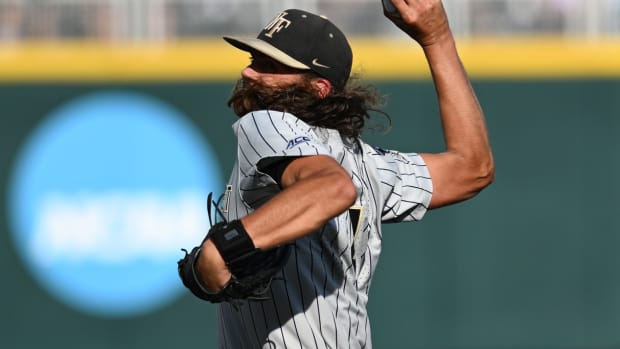 Jun 22, 2023; Omaha, NE, USA; Wake Forest Demon Deacons pitcher Rhett Lowder (4) throws against the LSU Tigers in the first inning at Charles Schwab Field Omaha. Mandatory Credit: Steven Branscombe-USA TODAY Sports  